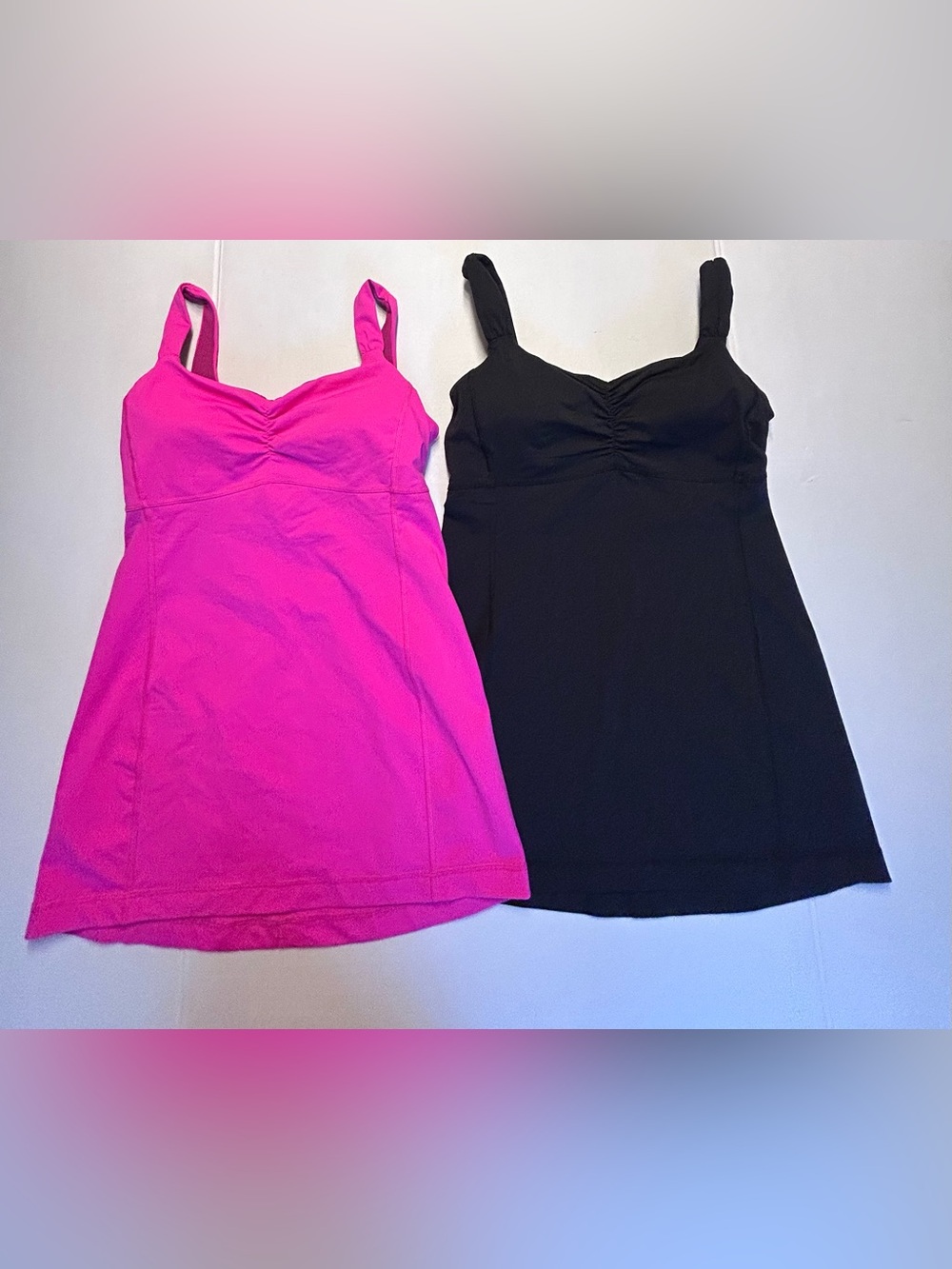 Lot Of 2 Lululemon Aria Tank tops Pink Black Size 8
Excellent pre-owned conditio